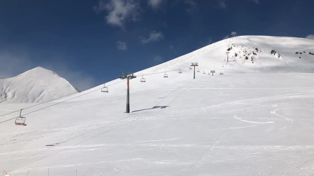 sunny day winter time gudauri ski resort slow motion panorama 4k georgia

