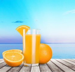 Orange juice and slices of orange on background © BillionPhotos.com