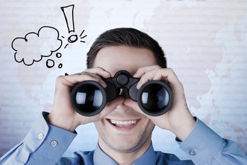 Handsome businessman with binocular on light blurred background
