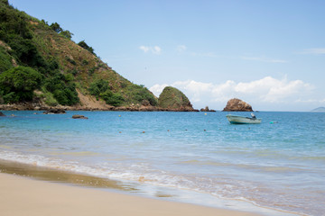 Boat at the sea with island view