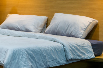 Fototapeta na wymiar Modern fabric pillows on luxury bed decoration contemporary