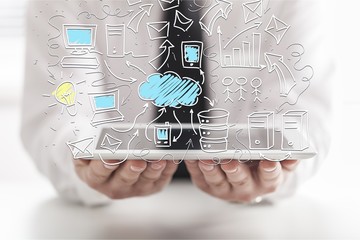 Businessman and tablet pc  with abstract business icon sketches
