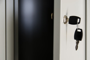 open locker with keys in the door