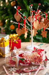 Christmas and New year gifts and baskets with sweets, alcohol, chocolate and cookies