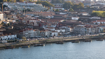 Fototapeta premium Cityscape of Vila Nova de Gaia and the Port wine district over the Douro River, Porto, Portugal