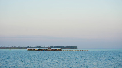Fototapeta na wymiar floating house on the small island in sea karimun jawa