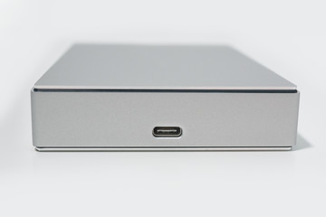 USB Type C / USB-C port on the back of a modern brushed aluminium external hard drive.