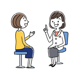 診察：女性医師と若い女性
