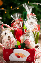 Christmas and New year gifts and baskets with sweets, alcohol, chocolate and cookies