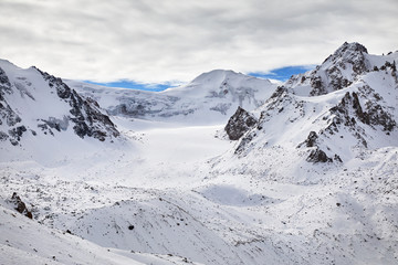 Fototapeta na wymiar Landscape of snowy mountains