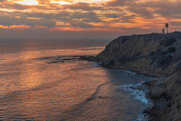 Fototapeta premium Coastal Sunset with orange sky