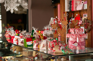 Christmas and New year gifts and baskets with sweets, alcohol, chocolate and cookies