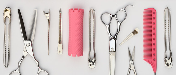 Set of professional hairdresser tools isolated on white background © thananya_k