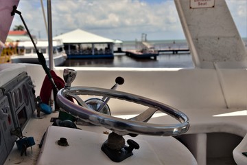 Steering wheel of tourist boat in belize