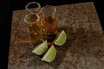 Golden tequila with lemon and salt. Drinks, Liquor