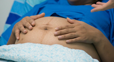 Pregnant woman with doctor in hospital. The concept is medical check up 