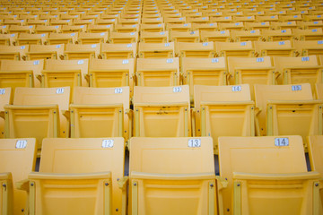 Fototapeta premium Yellow seats at the stadium
