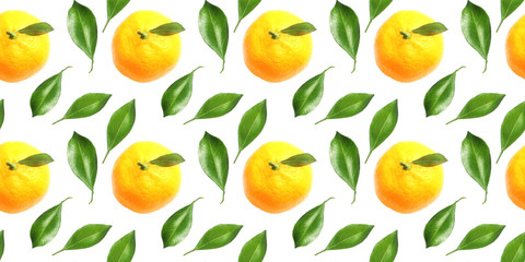 seamless pattern of tangerine and green leaves on a white background. flat lay, top view, holiday concept