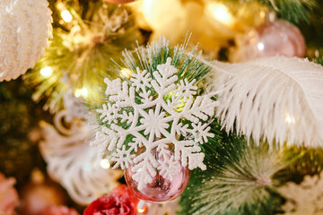 beautiful big snowflake on the Christmas tree branch, new year