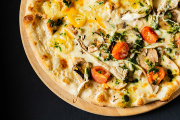 pizza on the black background