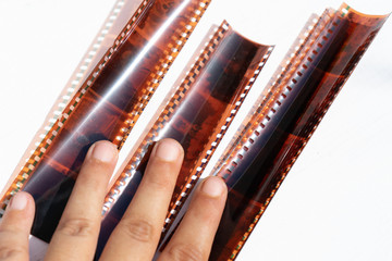 Photographic film strip and hand