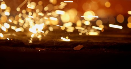 Wielding sparks falling in workshop 4k