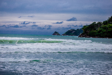 The background of the sea waves that hit the rocks at the beach, the period of storms and winds blowing all the time, refrain from the sea in this period.