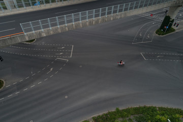 Aerial view on intersection with biker