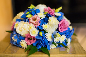Beautiful bouquet of bright white rose flowers, on table