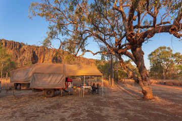 Off Road Camper Trailer setup up in the late afternoon at the camping area at Windjana Gorge, Gibb...