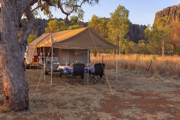 Off Road Camper Trailer setup up in the late afternoon at the camping area at Windjana Gorge, Gibb...