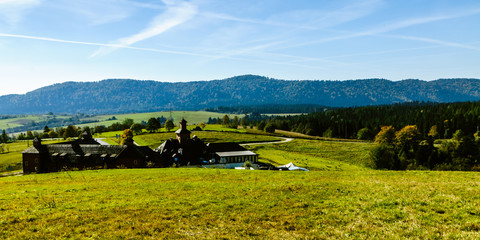 Fototapeta premium Bieszczady Mountains, Lutowiska, Poland. View from viewpoint near Lutowiska town in sunny day.