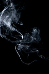 white smoke on black background