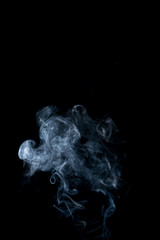 white smoke on black background