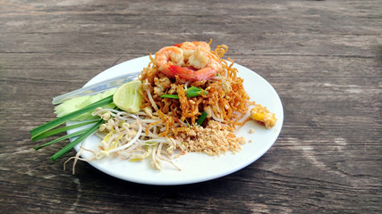 Crispy Padthai. Fried crispy noodle with shrimps, lime and nuts. Thai tradition and famous food.