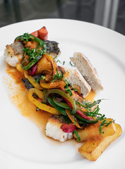 caldeirada traditional portuguese sea bream fish and vegetable spicy stew in gourmet restaurant