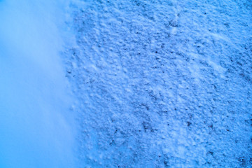 Fototapeta na wymiar Dirty white snow with pieces. Background and texture.