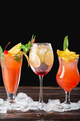 Multicolored cocktails at the bar close up shot