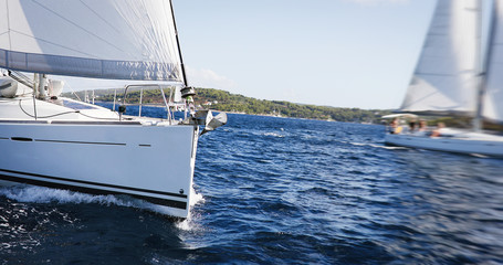 Fototapeta premium Luxury yachts at Sailing regatta. Sailing in the wind through the Sea.