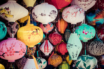 Colorful lanterns spread light on the old street of Hoi An Ancient Town - UNESCO World Heritage Site. Vietnam.