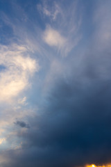 Obraz premium Clouds after rain before sunset as a background