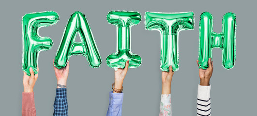 Hands holding faith word in balloon letters