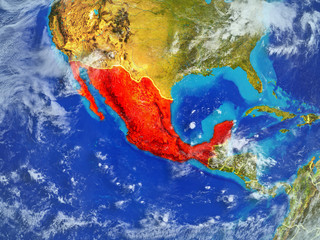 Mexico from space on model of planet Earth with country borders. Extremely fine detail of planet surface and clouds.