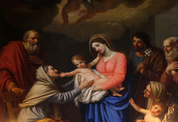 Fototapeta na wymiar Saint Anne adores the Child by Stefano Tofanelli, Basilica of Saint Frediano, Lucca, Tuscany, Italy 
