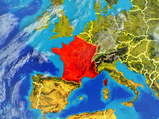 France from space on model of planet Earth with country borders. Extremely fine detail of planet surface and clouds.