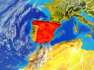Spain from space on model of planet Earth with country borders. Extremely fine detail of planet surface and clouds.
