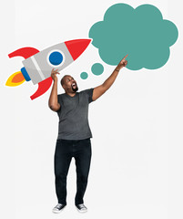 Creative man with a launching rocket symbol