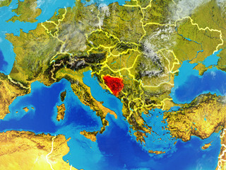 Bosnia and Herzegovina from space on model of planet Earth with country borders. Extremely fine detail of planet surface and clouds.