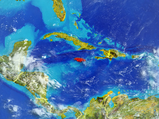 Fototapeta na wymiar Jamaica from space on model of planet Earth with country borders. Extremely fine detail of planet surface and clouds.