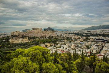 Acropolis and Athens cityscape heritage ruins place reconstruction view in cloudy rainy weather time